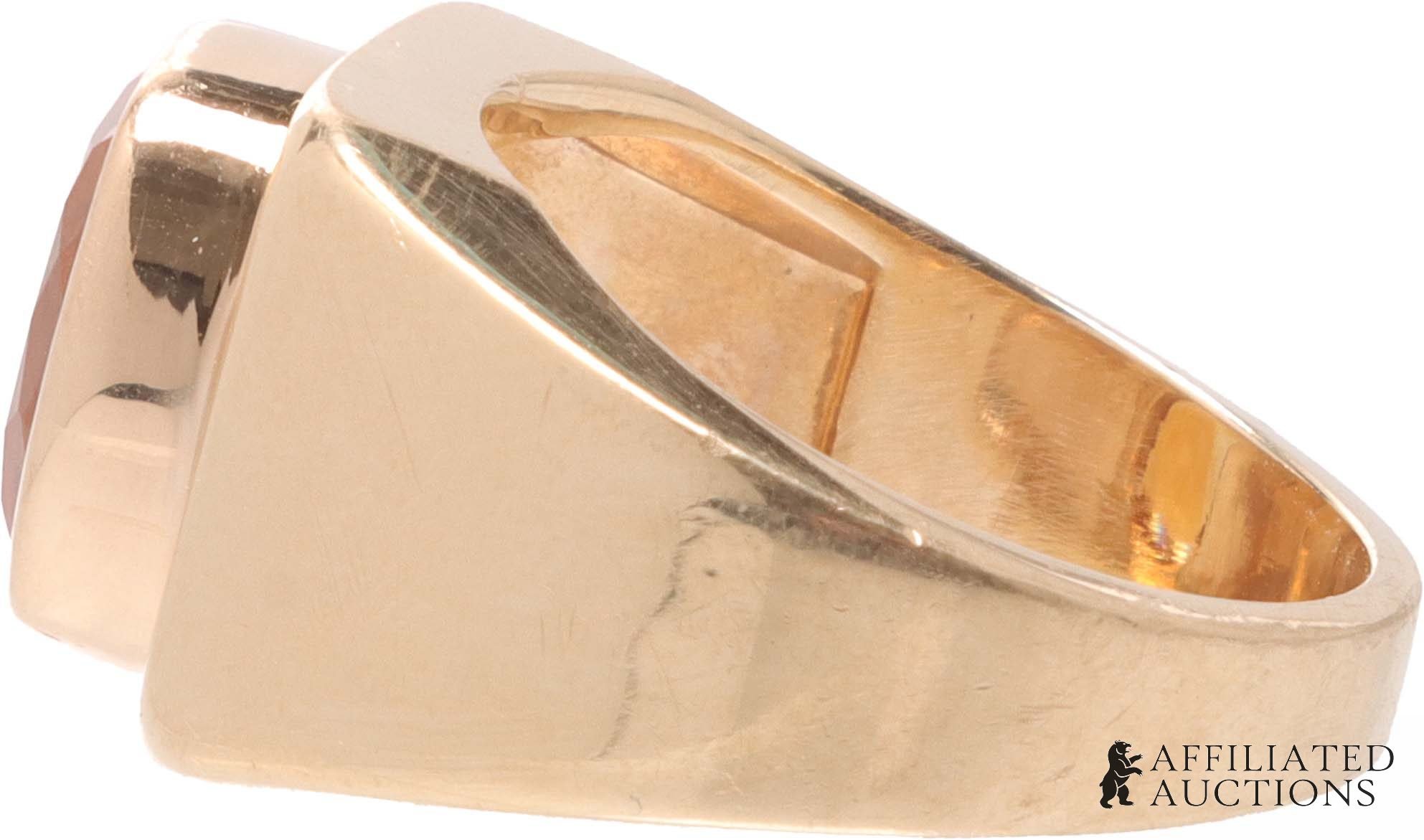 Side view of the 14K gold citrine ring showing the wide shank
