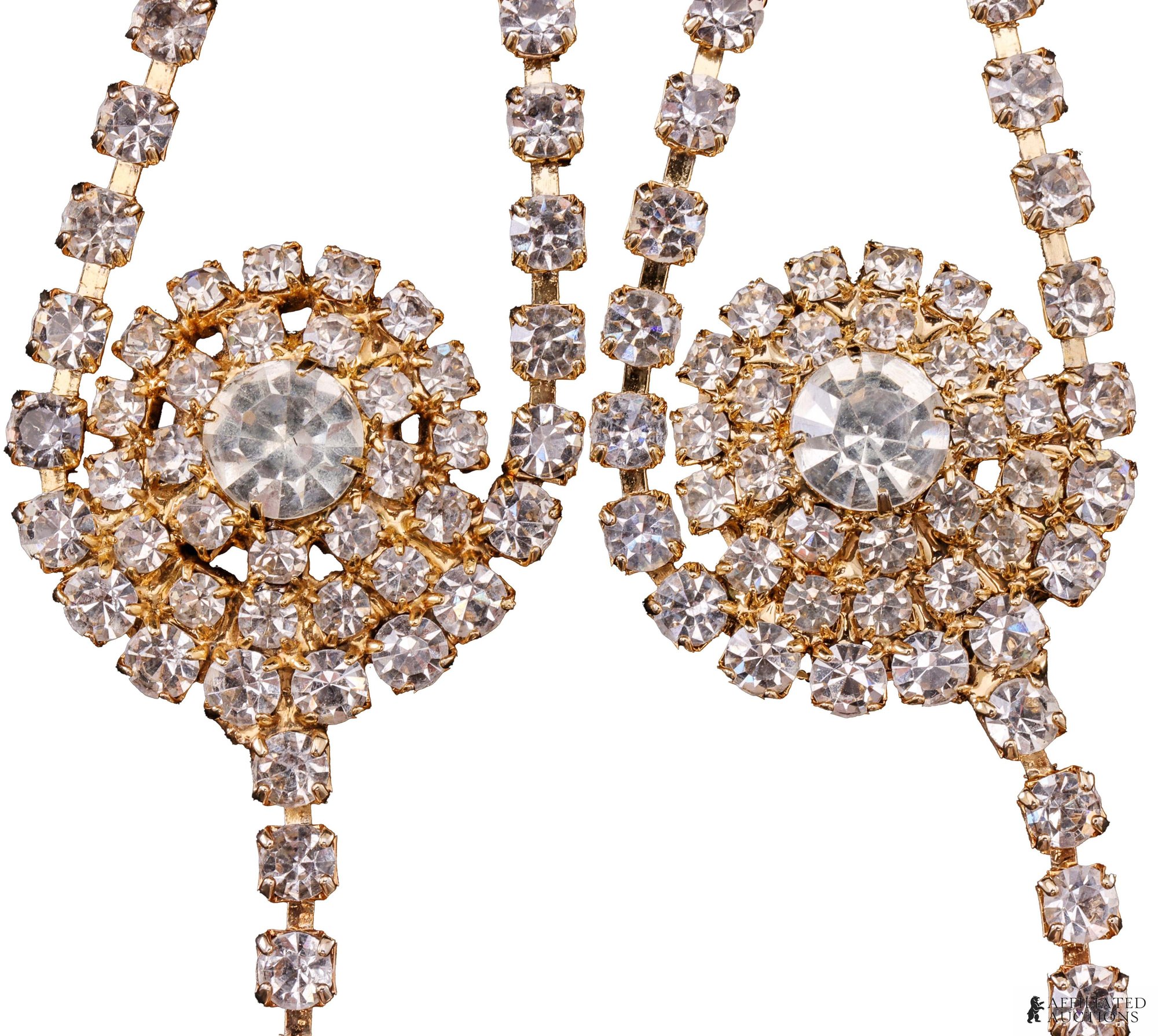 Close-up of the two circular rhinestone clusters on the Prince glove jewelry