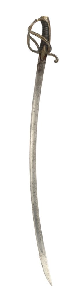 A curved sword with a brass hilt and intricate handguard.