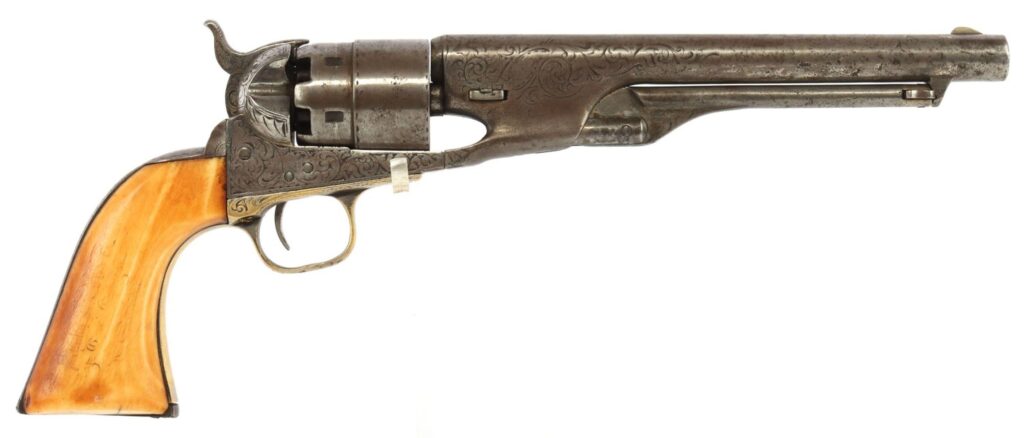 Side view of an intricately engraved antique revolver with a wooden grip.