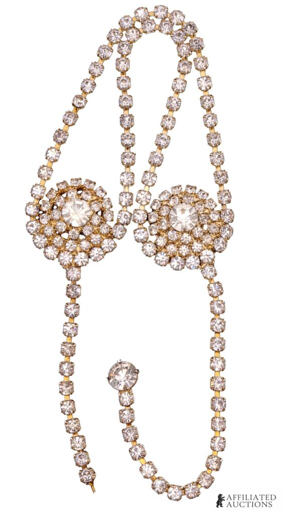 Prince Purple Rain tour rhinestone glove jewelry with two circular rhinestone clusters and chain ropes