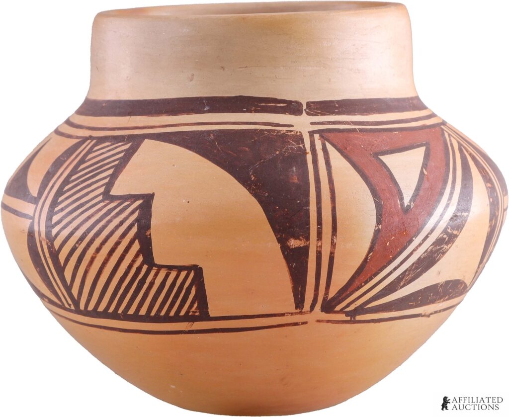 Olive Toney Hopi polychrome pottery jar with red and black geometric design